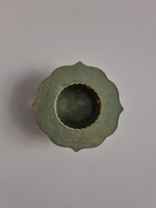 Tea-light wall sconce