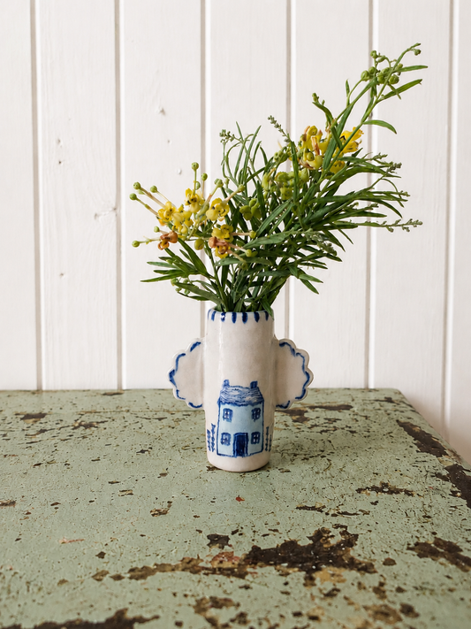 Winged bud vase